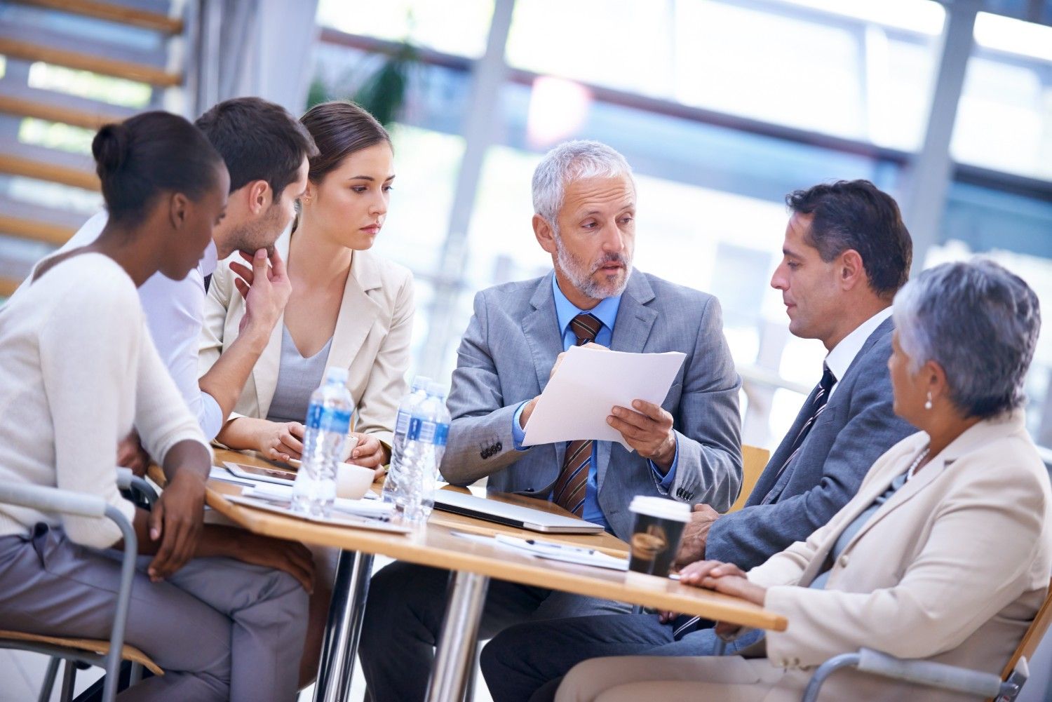 Executive team collaborating on white label sales strategy