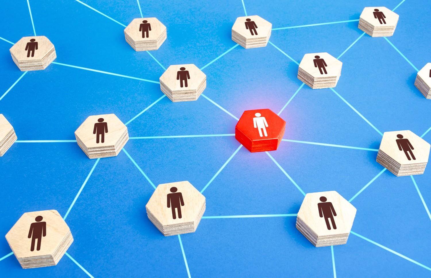 Abstract networking concept with red individual icon highlighted human network