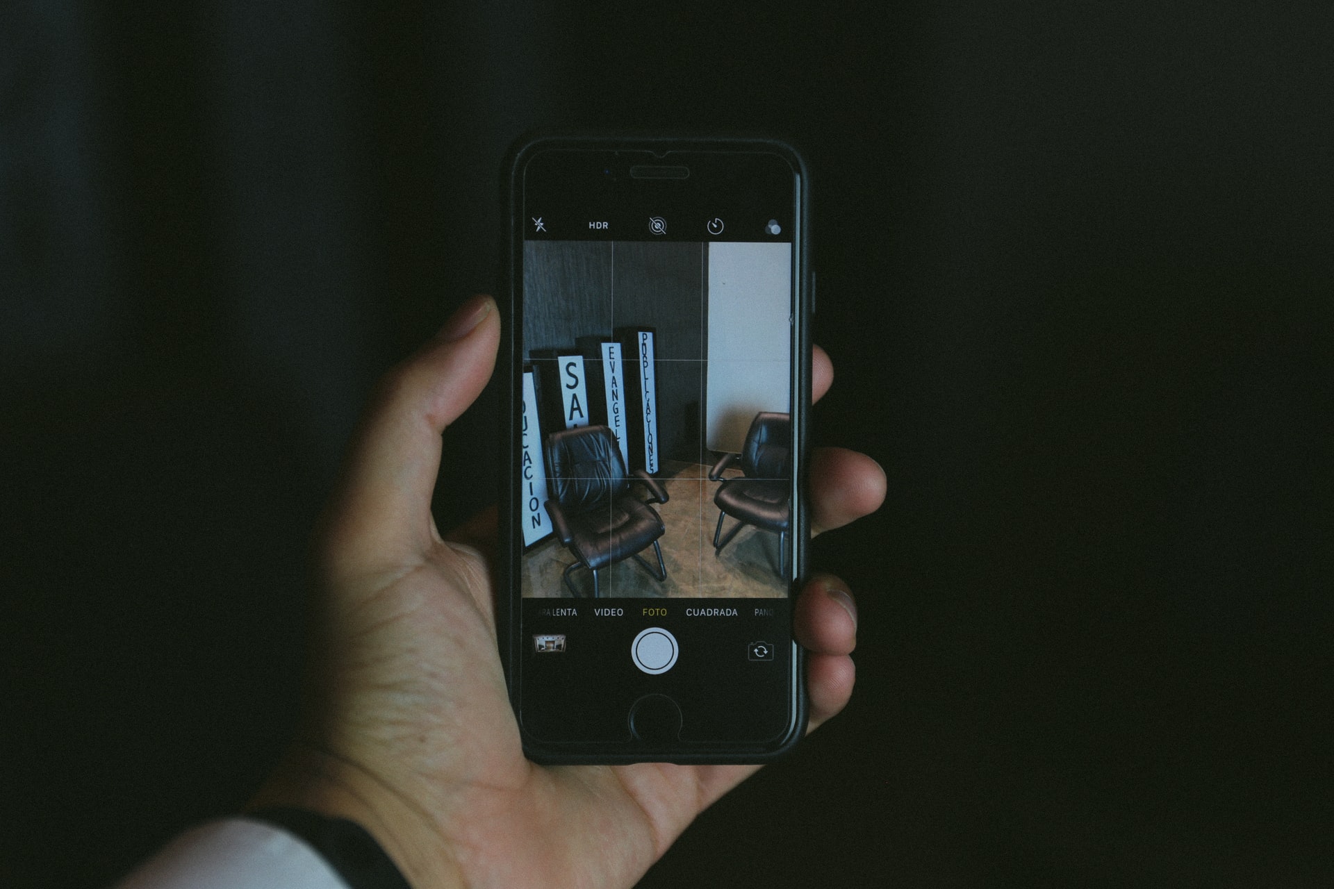 taking a photo of an office chair for a social media post