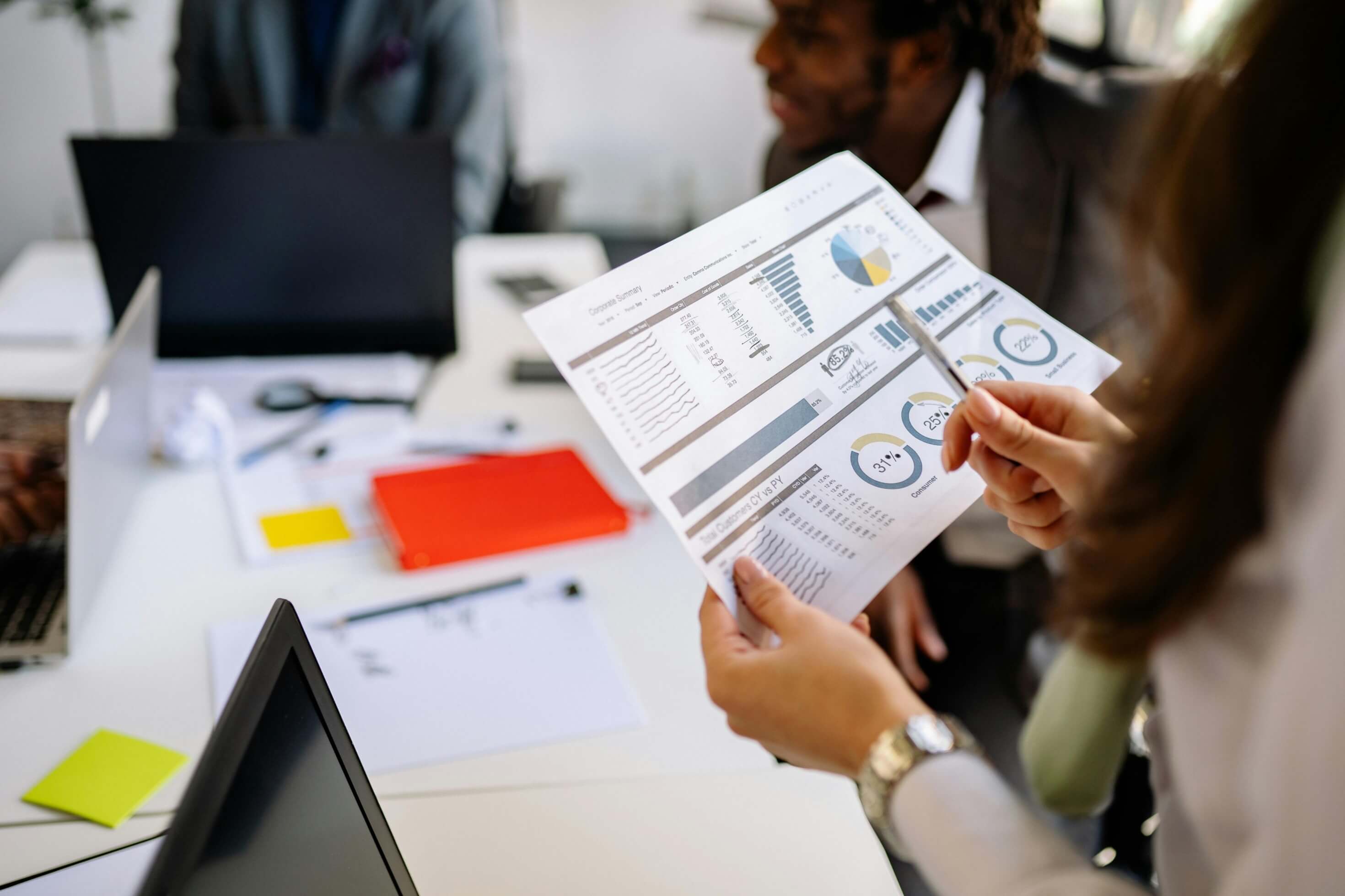 Depth financial review team analyzing quarterly performance and data