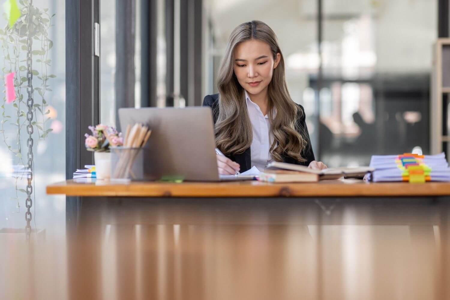 Focused professional reviewing paperwork