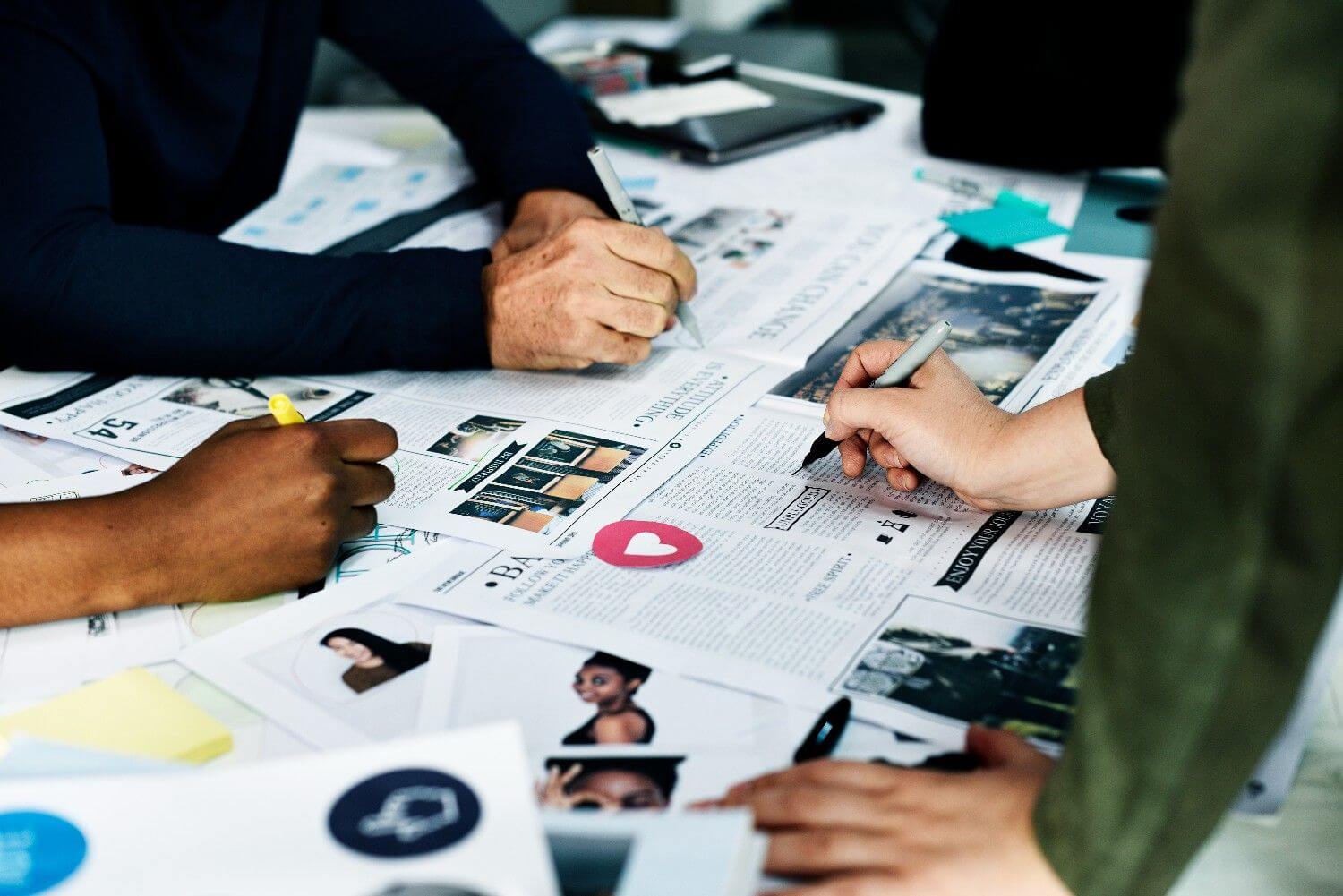 Startup business people working checking newspaper information