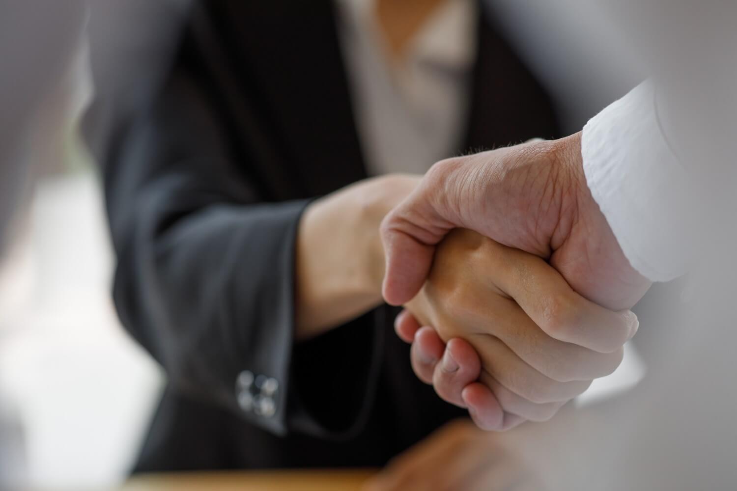 Businesswoman handshake and business people successful business concept.