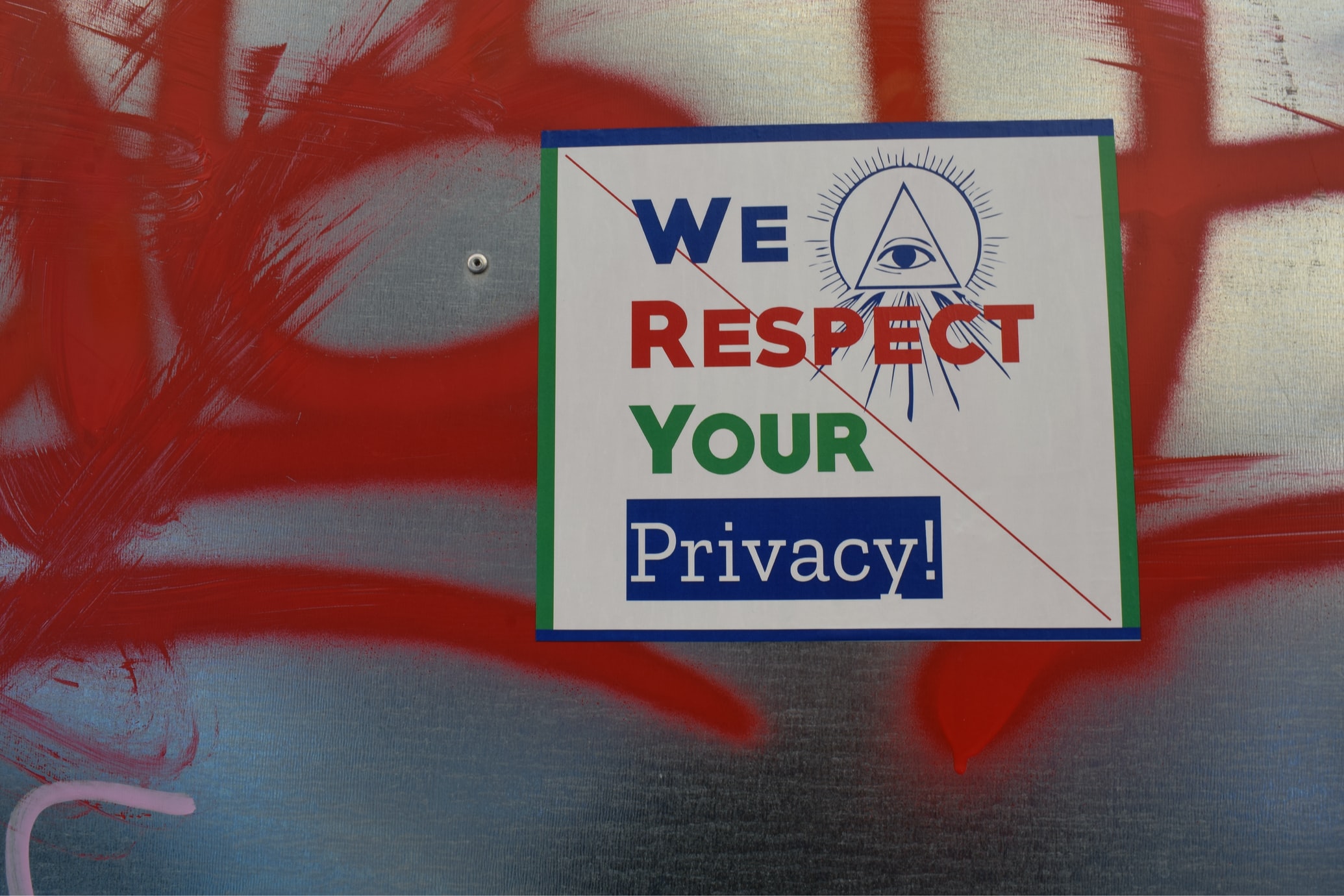 Privacy poster on a red and white textile background