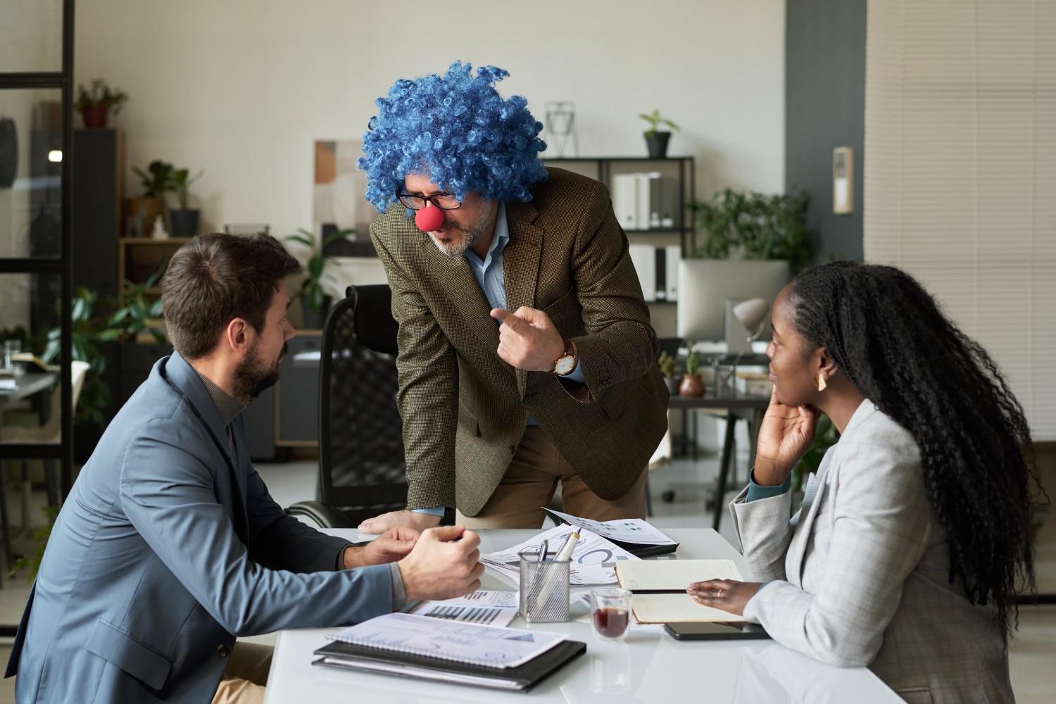 Angry boss clown costume office meeting