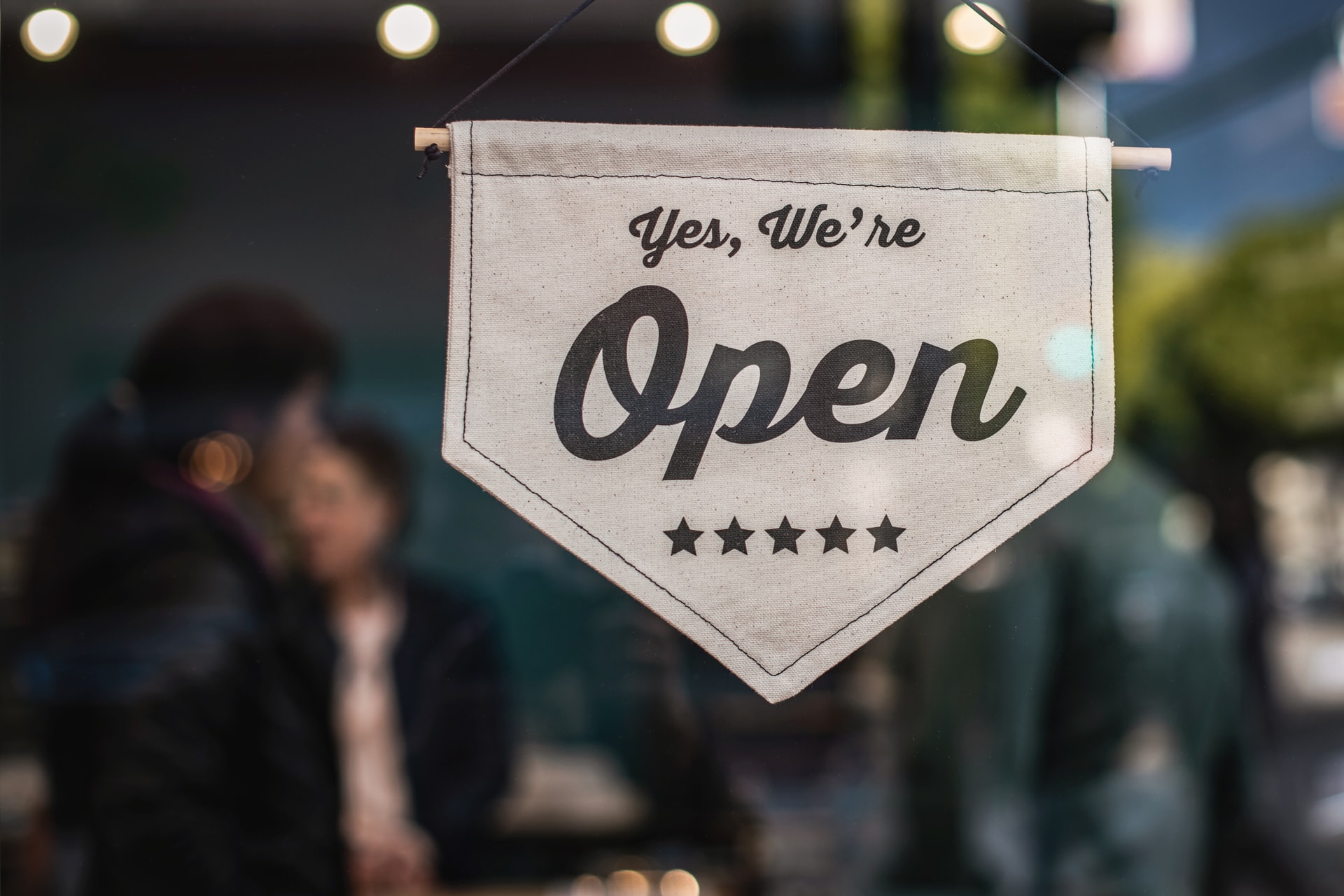 a small business with an open signage