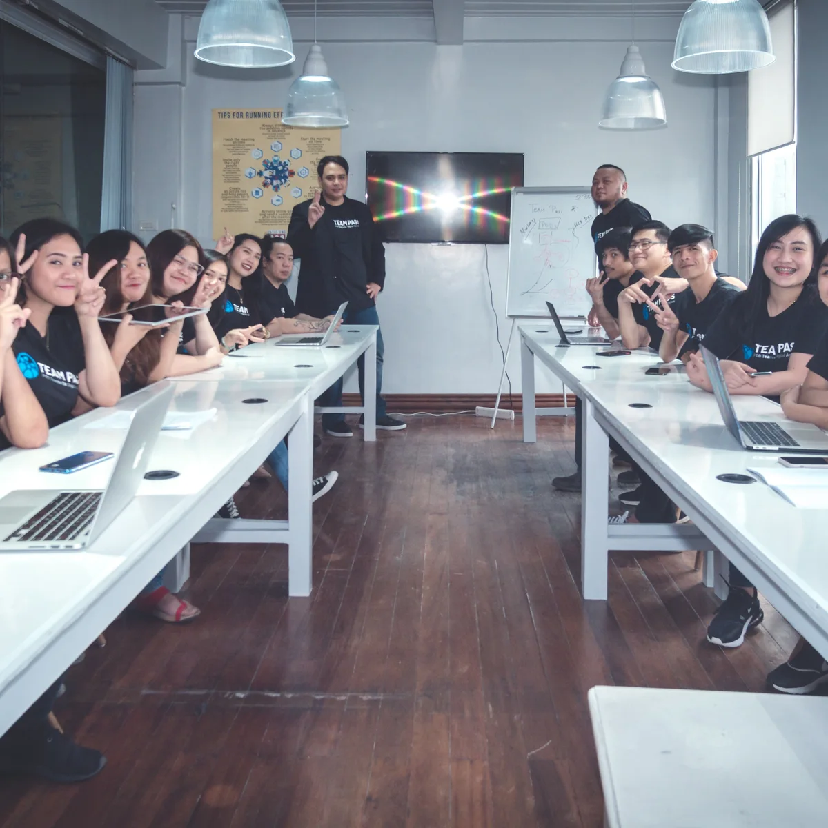 Murphy Consulting team members in a workshop session at a long table